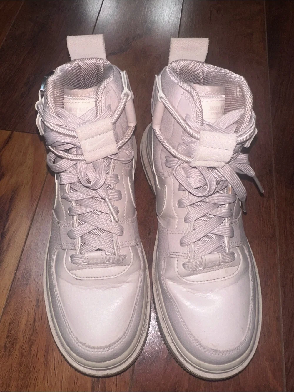 Nike High-Top Sneakers in Pale Pink